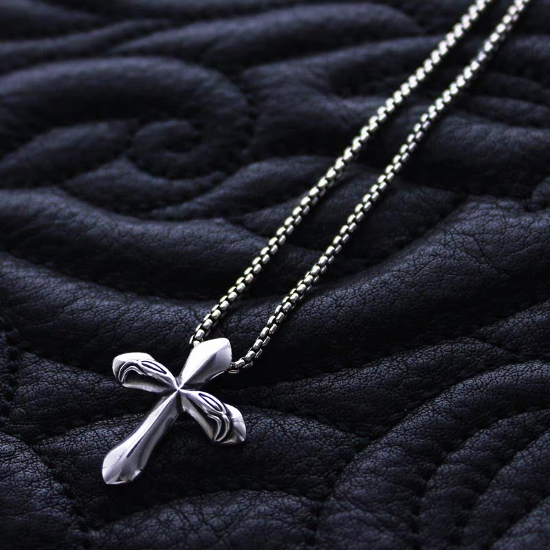 Carved Silk Cross Pendant